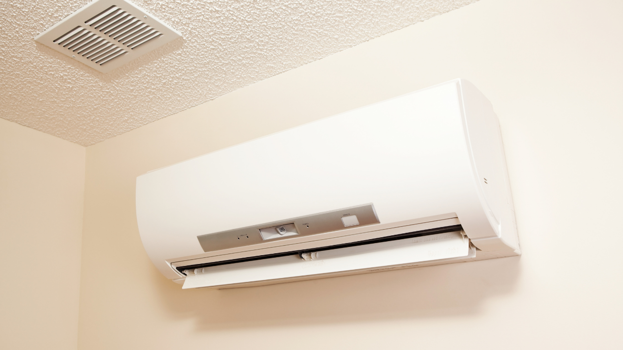 Outdoor AC condenser unit serviced by Arms Air Conditioning