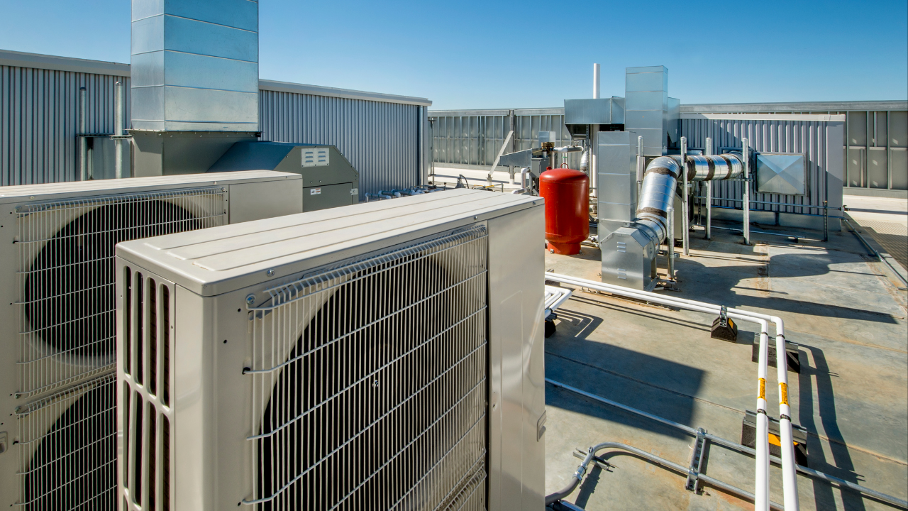 . Technician repairing residential furnace in Fresno, CA
